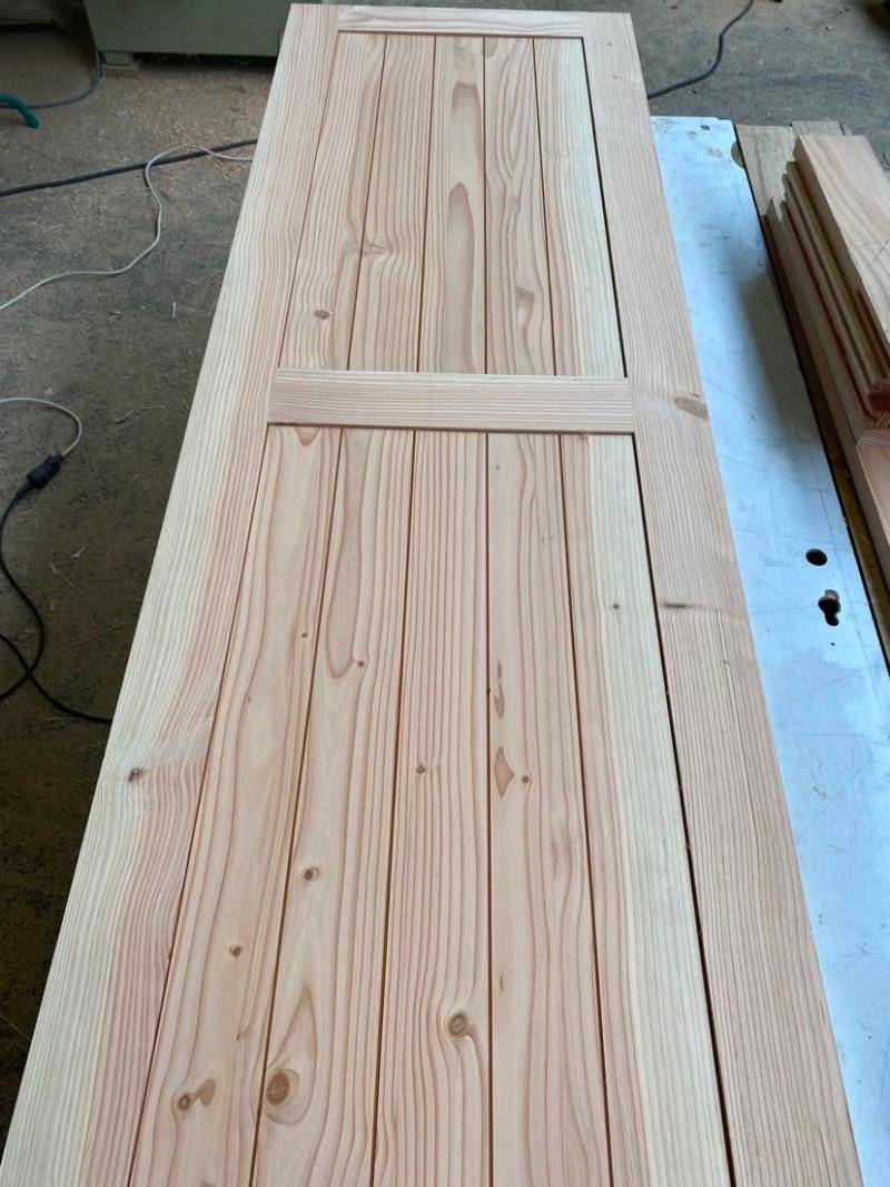 bardage porte ne bois
